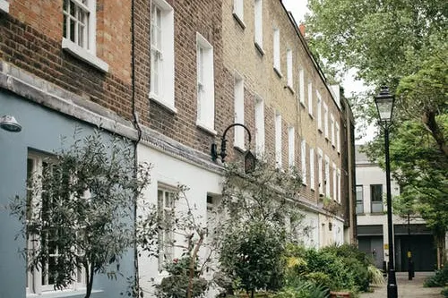 Brick terraced houses on a quiet Worcestershire street