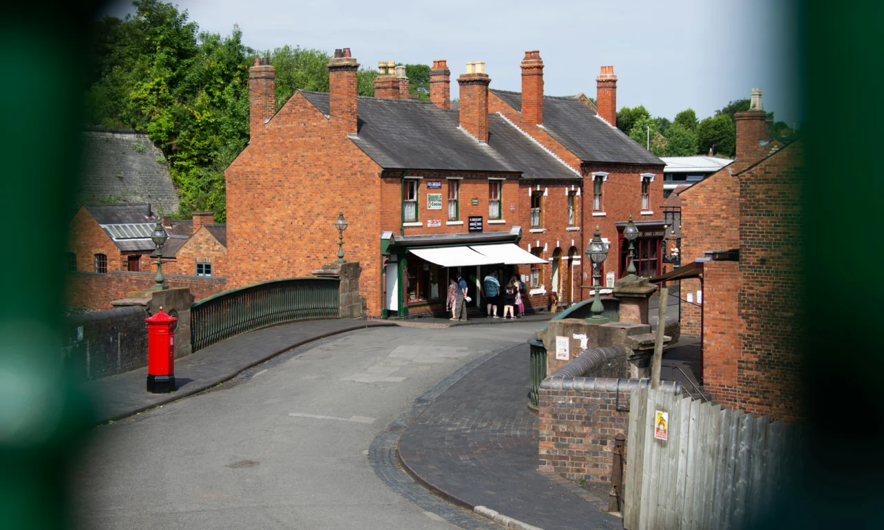 Old brick shops and houses on a Black Country street